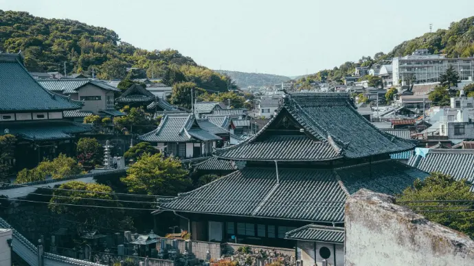 A breathtaking aerial view of Onomichi, where winding streets meet the calm waters of the Seto Inland Sea